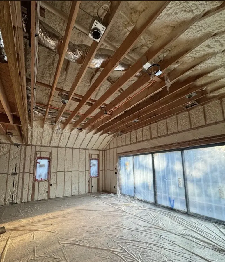 Interior walls and ceiling insulated with spray foam during new construction in Green Oak